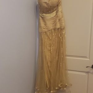 Beautiful Lara design sequined gold evening gown.